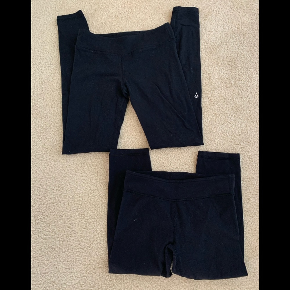 two pairs of black ivivva leggings